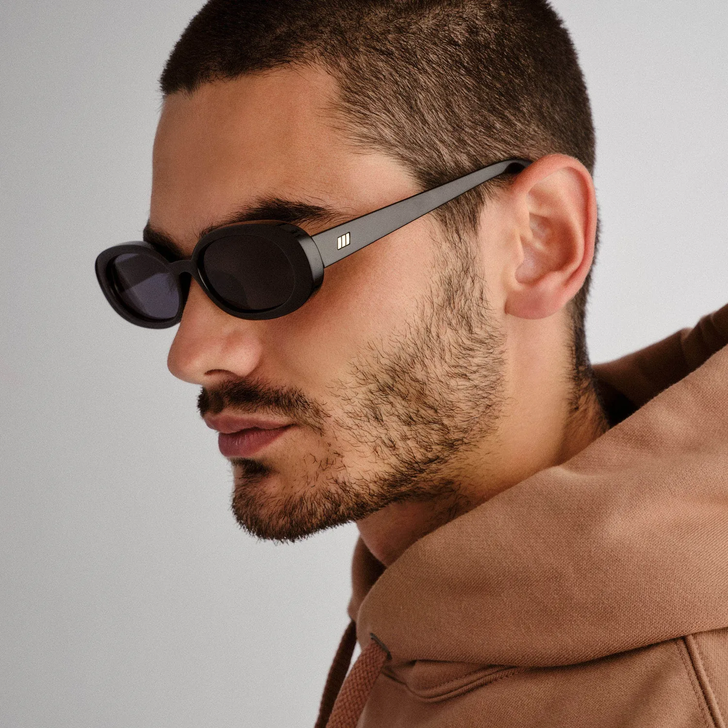 Le Specs Outta Love + occhiali da sole nero ovali