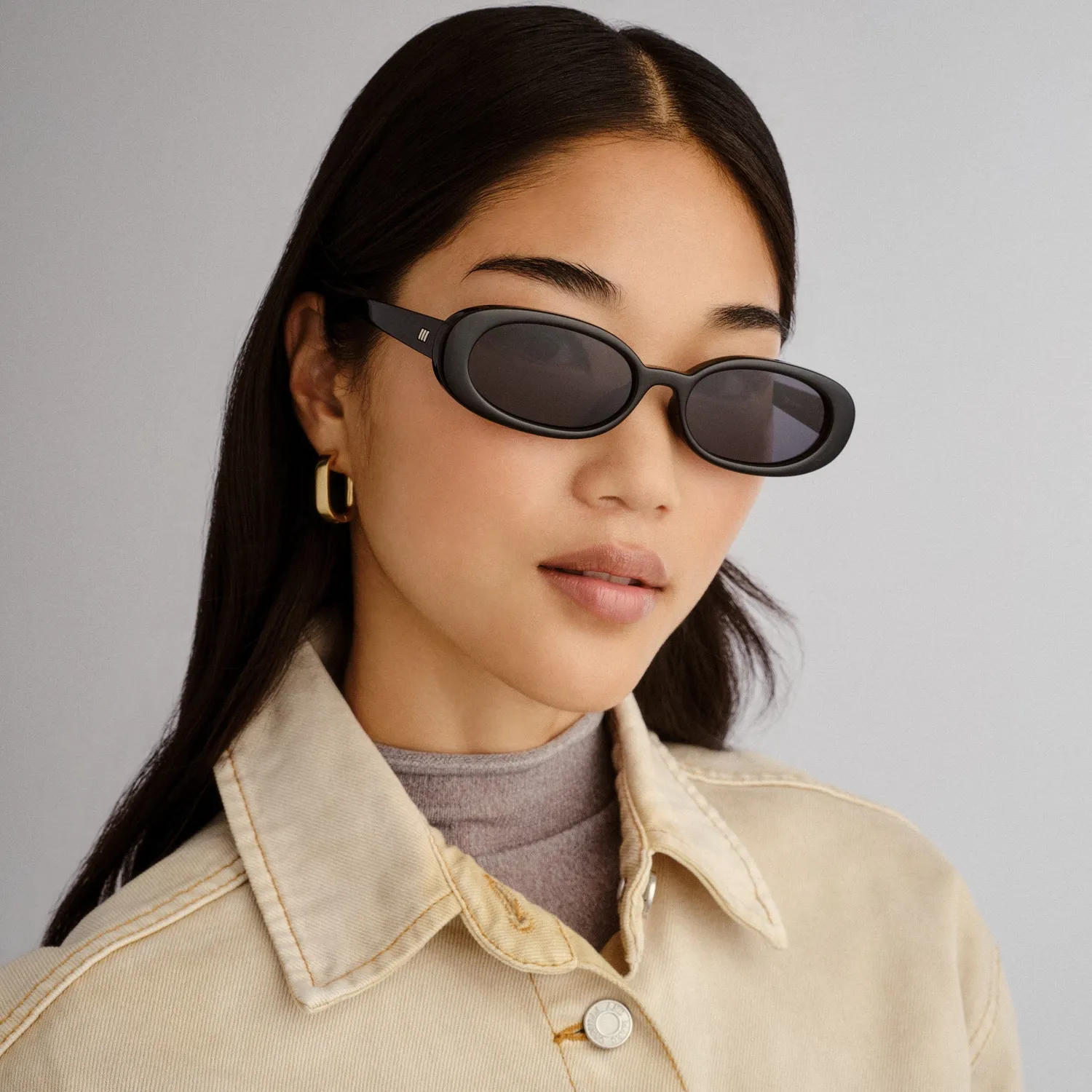 Le Specs Outta Love + occhiali da sole nero ovali
