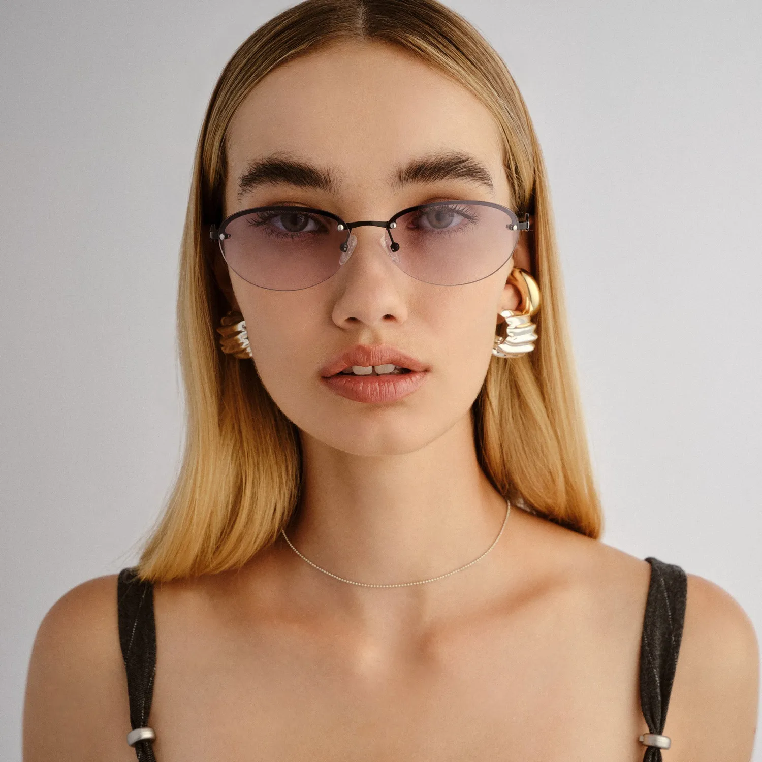 Le Specs Slinky occhiale da sole black senza montatura