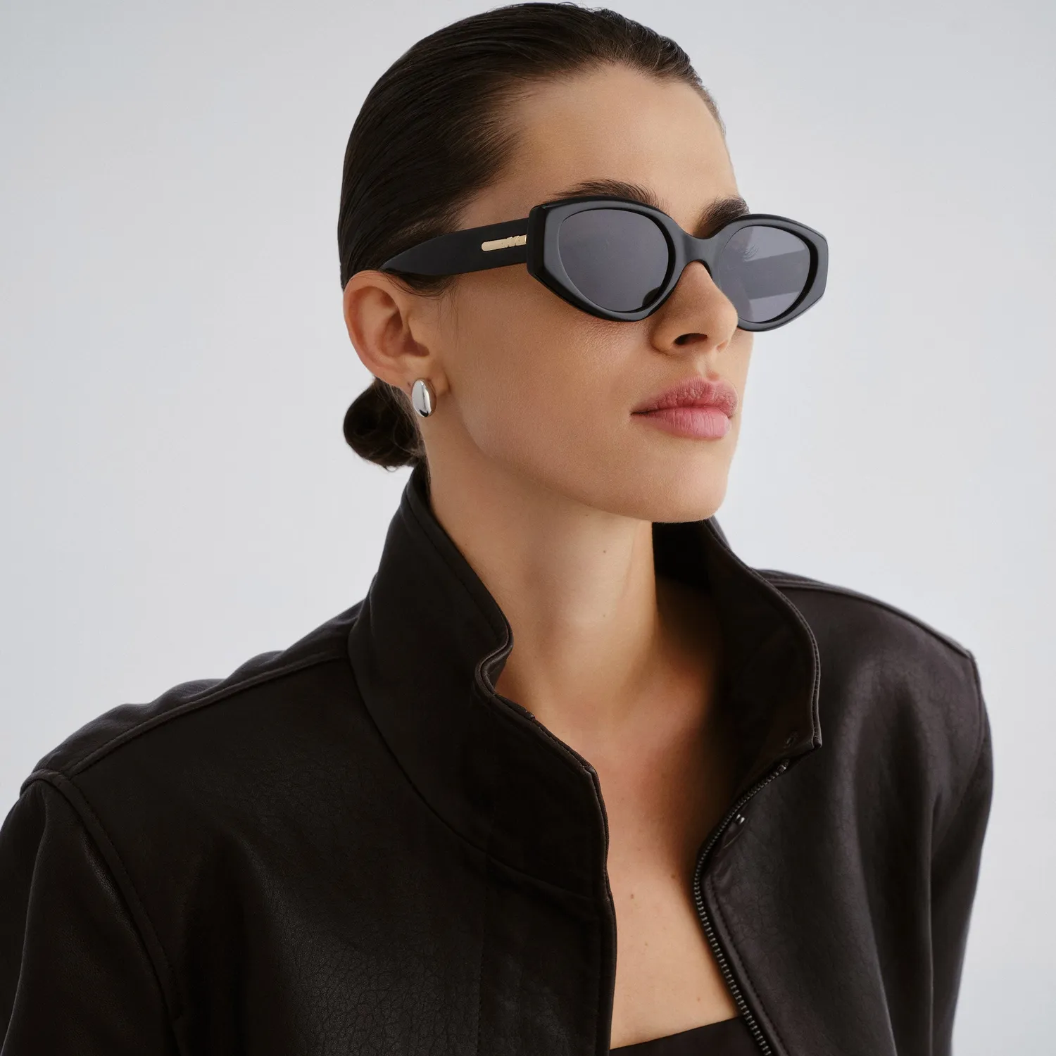 Le Specs Fevered + occhiali da sole nero ovali