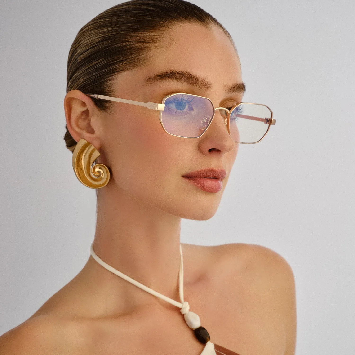 Le Specs Mythic occhiali luce blu oro ottagonali