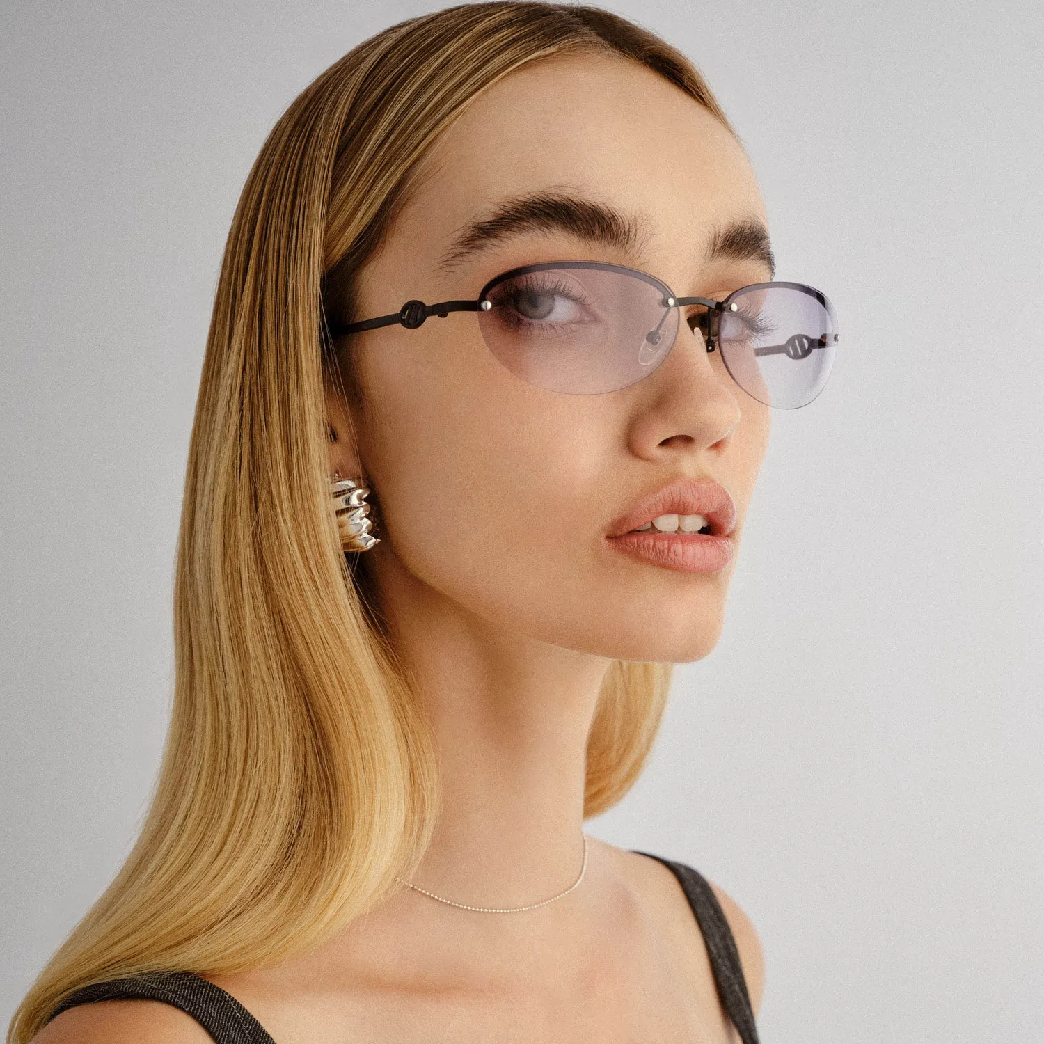 Le Specs Slinky occhiale da sole black senza montatura