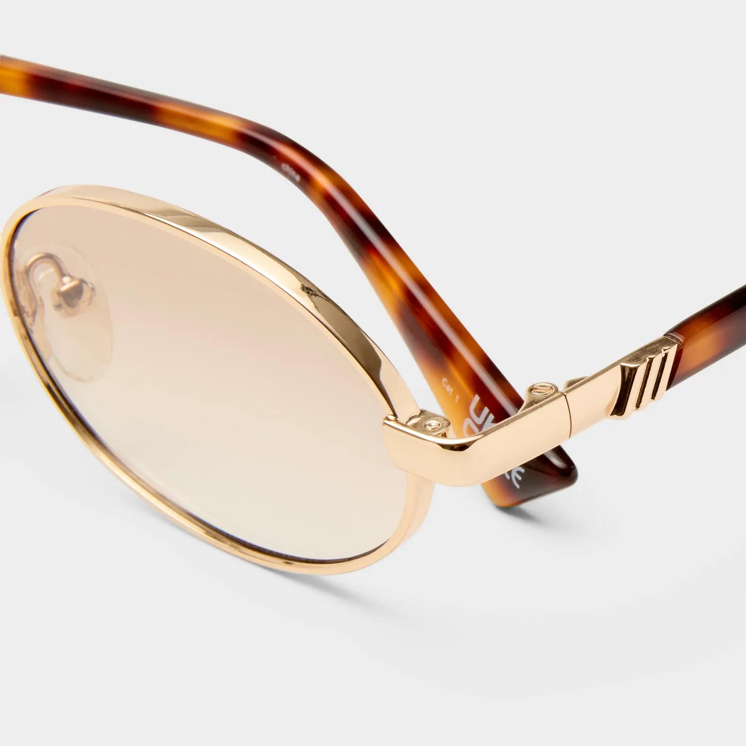 Le Specs Icicle occhiali da sole bright gold ovali