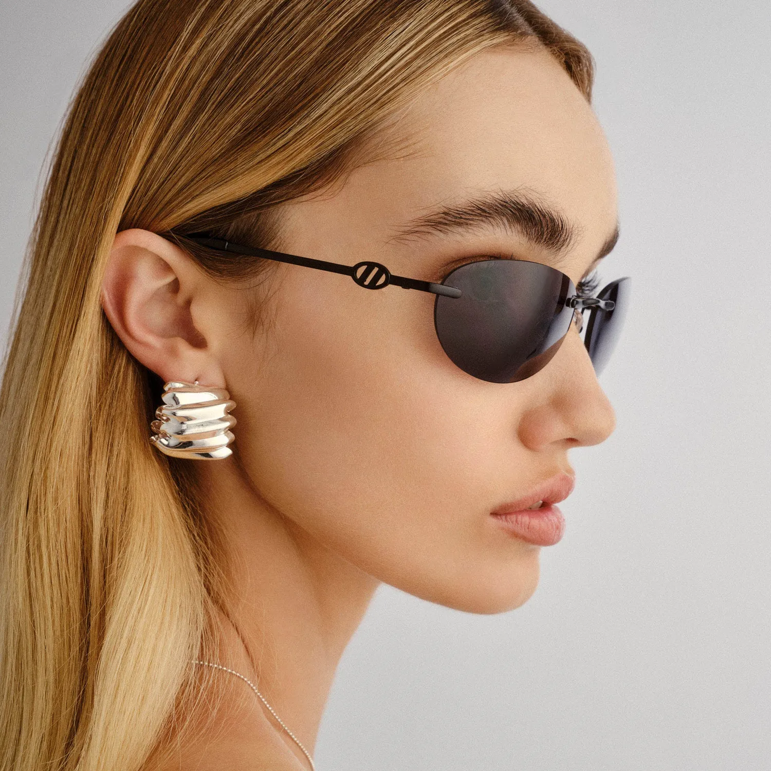 Le Specs Slinky occhiale da sole nero opaco rimless ovale
