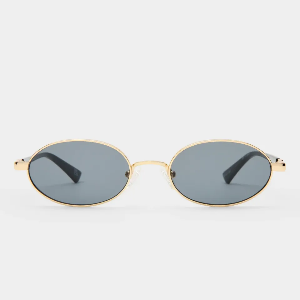 Le Specs Icicle occhiale da sole oro ovale fumo