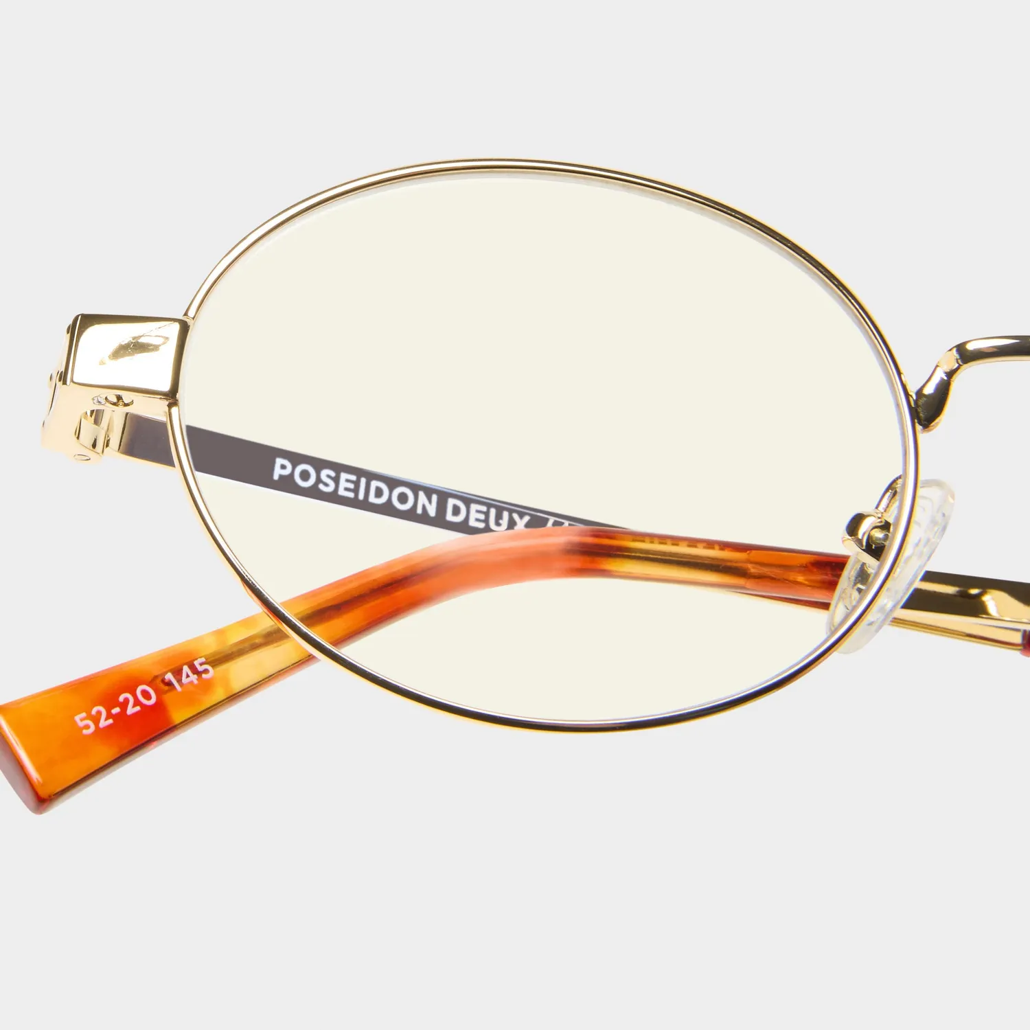 Le Specs Poseidon Deux occhiali luce blu oro ovali