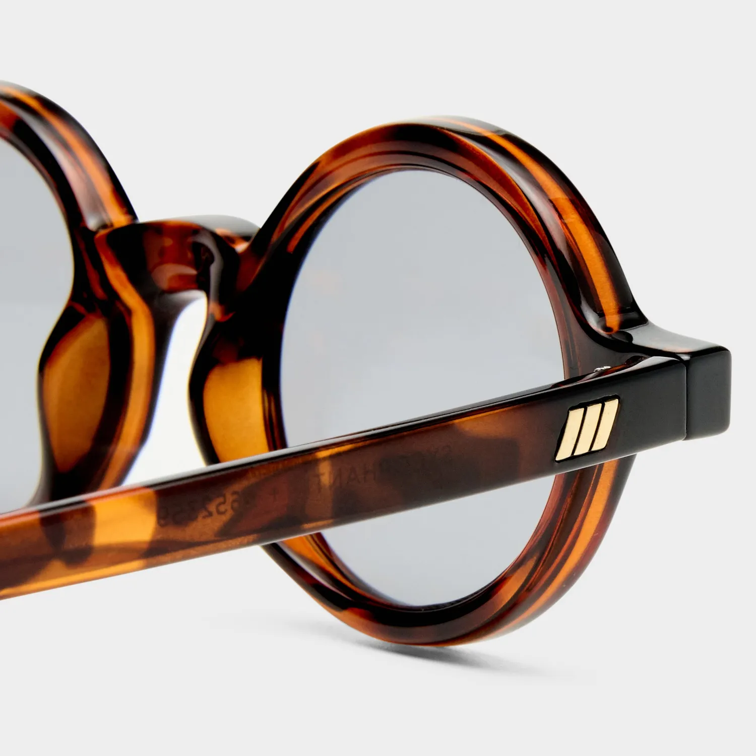 Le Specs Sycophantic + occhiali da sole tartarugato rotondi