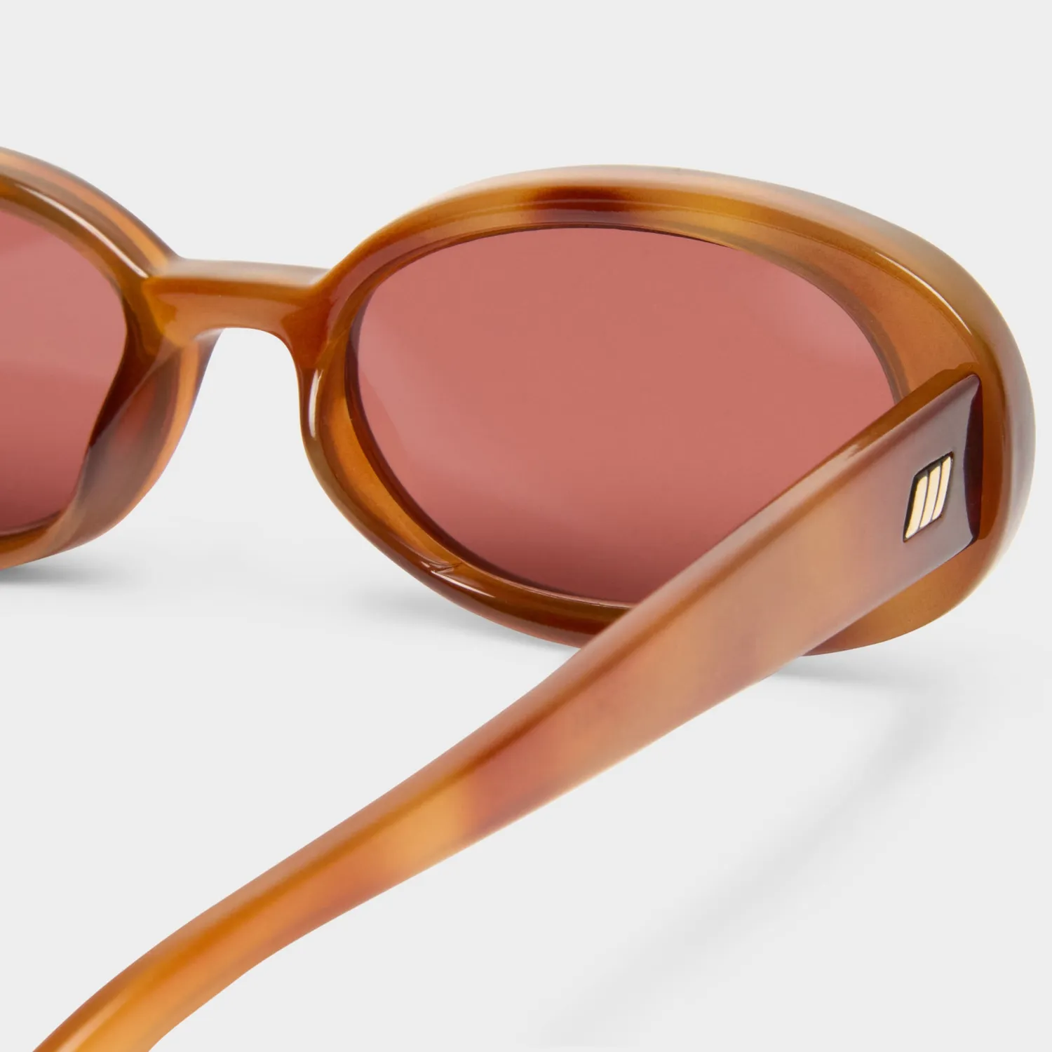 Le Specs Outta Love occhiali da sole ovali tartarugati rosa