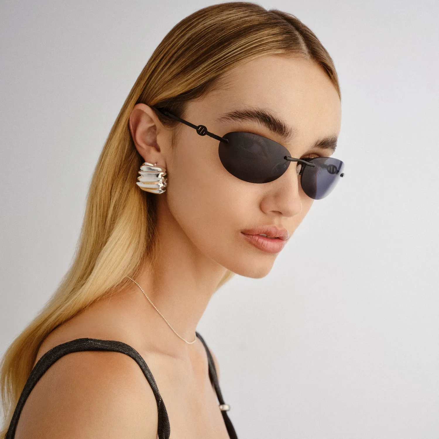 Le Specs Slinky occhiale da sole nero opaco rimless ovale