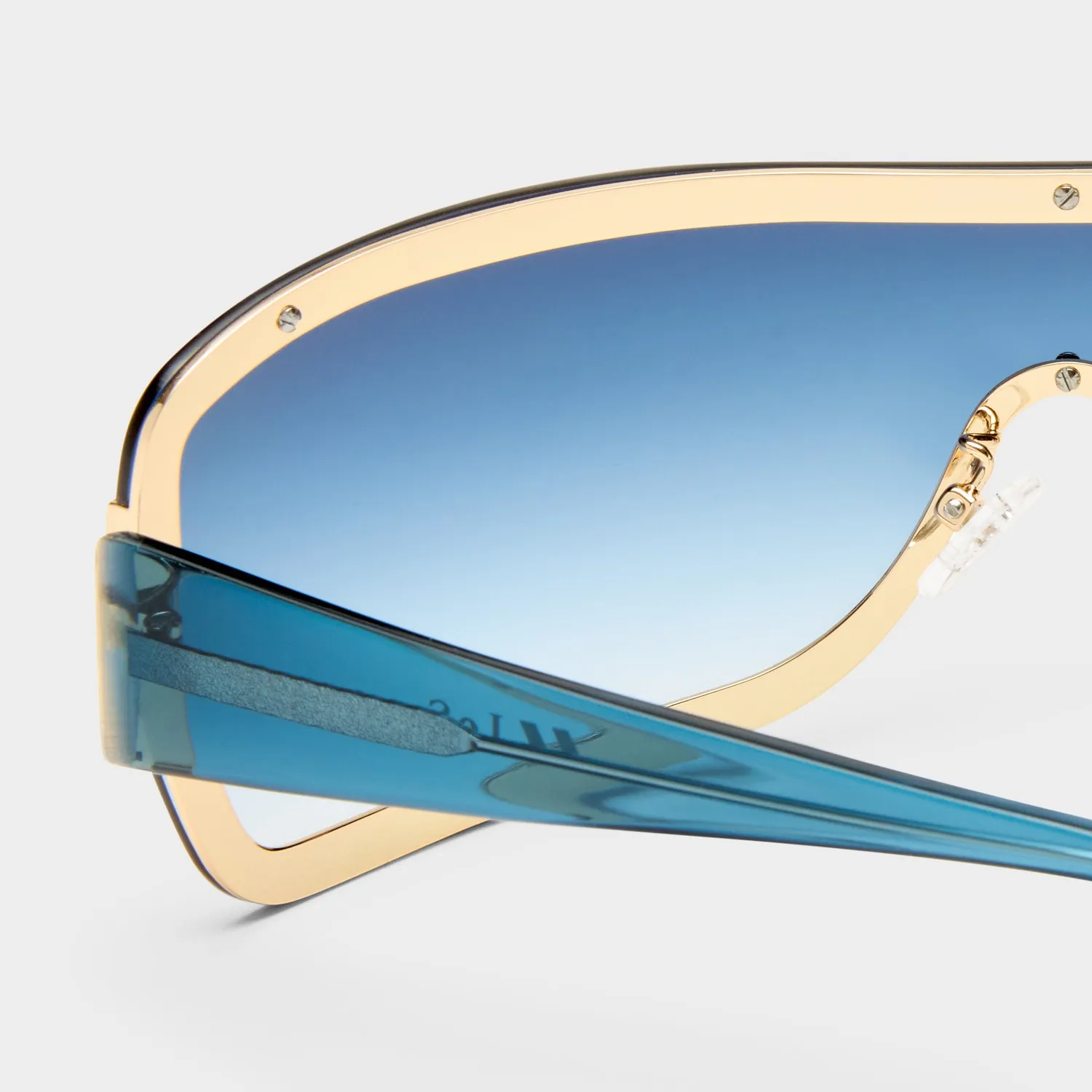 Le Specs Veiled occhiale da sole shield oro blu large