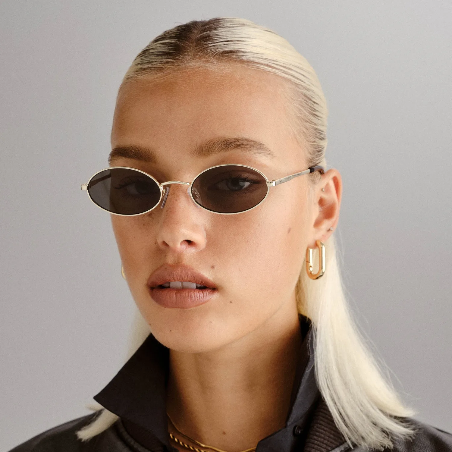 Le Specs Love Train occhiali da sole ovali oro khaki mono